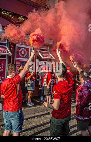 LIVERPOOL, ENGLAND - MAY 19: The Liverpool Football Club fans celebrate  at Anfield Stadium after the Premier League match Stock Photo