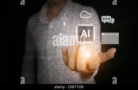 Artificial Intelligence. AI technology. A man uses Ai tech while virtual graphic and circuit connection shown in his hand Stock Photo