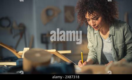 Close Up Portrait of a Dark-Skinned Multiethnic Brunette with Curly Hair and Brown Eyes. Happy Creative Young Woman Looking at Camera and Charmingly Smiling. Stock Photo