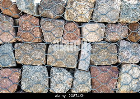 The wall protects from the erosion of rocks on the slopes.seaside. Stock Photo
