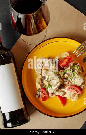 Veal ribs with peanut puree, mushroom cream sauce and red wine Stock Photo