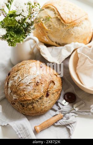 Freshly baked sourdough bread on table Stock Photo