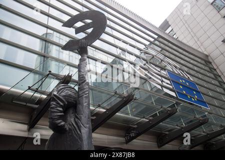 Bronze statue Europe from 1993 by May Claerhout, statue of Europa holding the Greek epsilon, symbol of euro currency, in front of the Paul-Henri Spaak Stock Photo