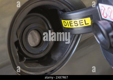 Fuel cap for diesel engine car closeup. Automobile tank refueling Stock Photo