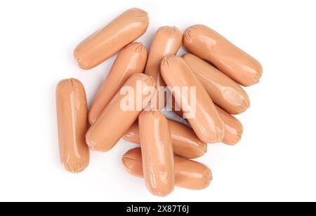 Pile of small raw uncooked chicken meat hot dog wieners isolated on white background Stock Photo