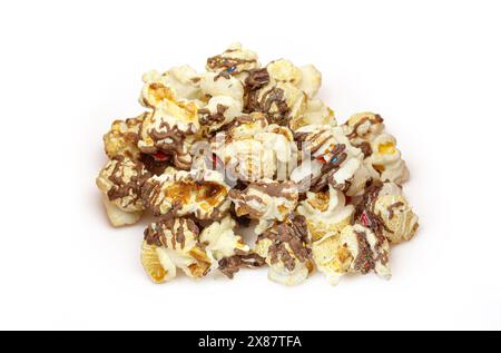 Pile of chocolate covered candy popcorn isolated on white background Stock Photo