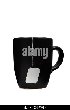 Black tea cup mug with blank white label tag isolated on white background Stock Photo