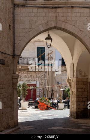 Charming Street Scene in Old Town Italy in the Late Afternoon in Giovinazzo, Italy. Stock Photo