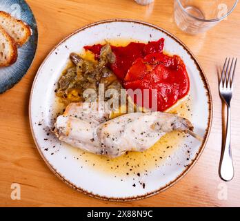 Roasted rabbit served with potato and vegetables Stock Photo