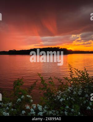 Dramatic stormy sunset over Lake Marburg at Codorus State Park, Pennsylvania Stock Photo