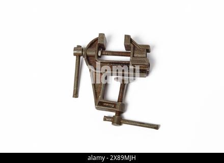 Mechanical hand vise clamp, isolated on white background. Manual instrument, space for text Stock Photo