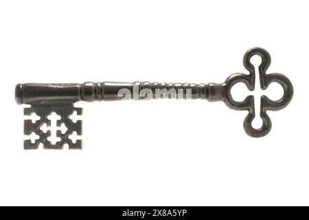 Old door key on white background Stock Photo