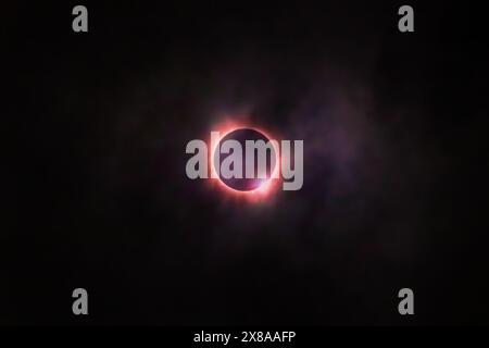 Total solar eclipse 2024 Texas with visible solar eruptions Stock Photo
