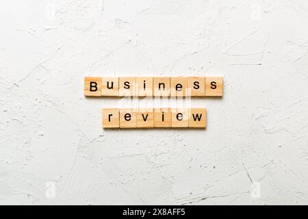 business review word written on wood block. business review text on table, concept. Stock Photo