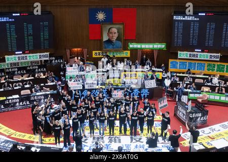 Taipei, Taiwan. 24th May, 2024. The lawmakers of Democratic Progressive Party (DPP) protest against the the controversial bill during the demonstration. Thousands of demonstrators gathered outside of the parliament to protest against the controversial bill that would expand the power of the legislature. Credit: SOPA Images Limited/Alamy Live News Stock Photo