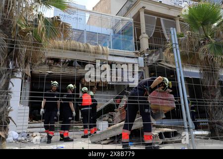 Palma, Spain. 24th May, 2024. Firefighters work at the site of the collapse. Two German women and two other people have died in the collapse of a fully occupied restaurant in Playa de Palma on Mallorca. Credit: Clara Margais/dpa/Alamy Live News Stock Photo