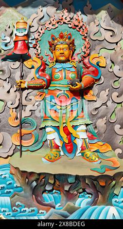 Colourful Thangka Tibetan Painting of Buddhist deity on Monastery Wall, Shechen Monastery, Kathmandu, Nepal. Stock Photo