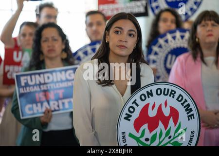 U.S. Representative Alexandria Ocasio-Cortez joins a group of elected officials in the Bronx, NY May 20, 2024 for the “Not On Our Dime!” state bill, for an announcement regarding the re-launch and expansion of the bill. The first-in-the-nation legislation would make it illegal for New York state-registered charities to fund violations of international law in Israel. Bronx, NY May 20, 2024. (Photo by Steve Sanchez/Sipa USA). Stock Photo