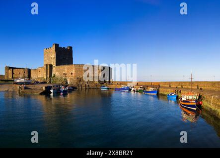 Carrickfergus Castle overlooking  Carrickfergus harbour in County Antrim, on the northern shore of Belfast Lough, Northern Ireland. Stock Photo