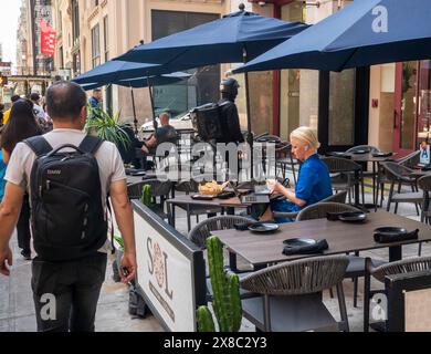 Diners take advantage of the unseasonably warm weather to do al fresco working and dining in NoMad in New York on Tuesday, May 21, 2024. (© Richard B. Levine) Stock Photo