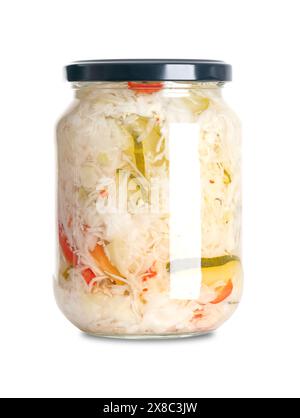 Puszta salad, pickled vegetables, in a glass jar. White cabbage, gherkins, red bell peppers, onions and pasteurized and preserved in a spicy marinade. Stock Photo