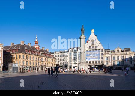 Lille, France - June 22 2020: The Grand Place with the Old Stock Exchange (Vieille Bourse), the Column of the Goddess (Colonne de la Déesse), the buil Stock Photo