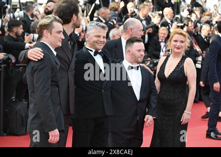 'En fanfare' ('The Marching Band') film cast: Benjamin Lavernhe, guest, guest, Jacques Bonnaffé, guest 'Horizon: An American Saga' Cannes Film Festival Screening  77th Cannes Film Festival  May 19, 2024 credit:Jacky Godard/Photo12 Stock Photo