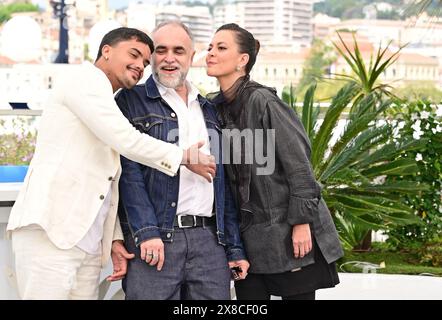 Iago Xavier, Karim Aïnouz, Nataly Rocha Photocall of the film 'Motel Destino'  77th Cannes Film Festival  May 23, 2024 credit:Jacky Godard/Photo12 Stock Photo