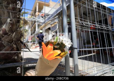 Palma, Spain. 24th May, 2024. Flowers at the Medusa Beach Club building after the collapse that killed two German women and two other people. Credit: Clara Margais/dpa/Alamy Live News Stock Photo