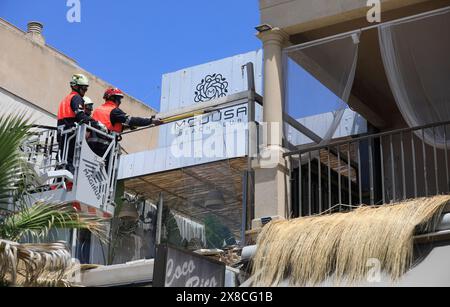 Palma, Spain. 24th May, 2024. Firefighters work on the Medusa Beach Club building after it collapsed. Two German women and two other people died in the collapse of the restaurant on Playa de Palma in Mallorca. Credit: Clara Margais/dpa/Alamy Live News Stock Photo