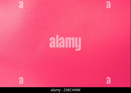 Clean pink leather texture background macro close up view Stock Photo
