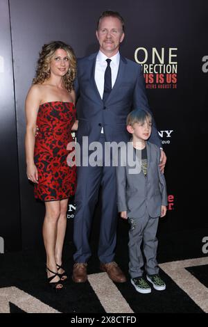 Director Morgan Spurlock (c), Sara Bernstein and son Laken James attend the New York premiere of 'One Direction: This Is Us' at the Ziegfeld Theater o Stock Photo