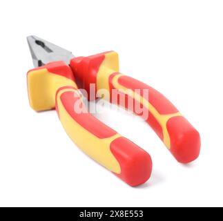 New combination pliers isolated on white. Construction tool Stock Photo