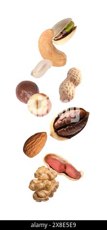 Many different nuts in air on white background Stock Photo