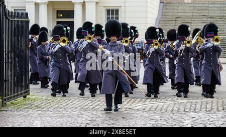 London, UK - March 23, 2024; Kings Guard Band of the Welsh Guards exit Wellington Barracks in formation Stock Photo