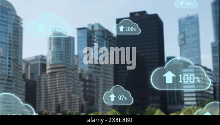 Image of growing numbers with up arrows in clouds over modern buildings in background Stock Photo