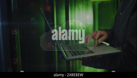 Image of cloud and data processing over asian man using laptop Stock Photo