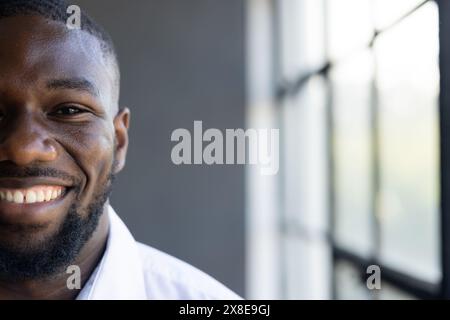 Young African American male with short black hair and beard smiling Stock Photo