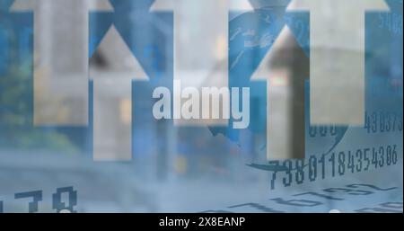 Image of arrow icons moving upwards, spinning globe, changing numbers over view of city traffic Stock Photo
