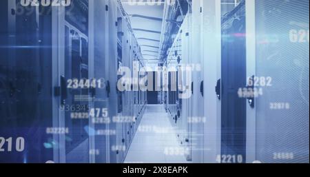 Image of multiple changing numbers, data processing and light spot against computer server room Stock Photo