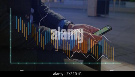 Image of graphs over midsection of caucasian businessman surfing on smartphone Stock Photo