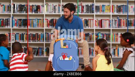 Caucasian male, in blue shirt, teaches diverse students with red book Stock Photo