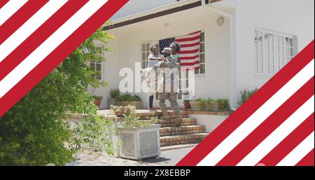 African American young professional and daughter/student are welcoming home soldier Stock Photo