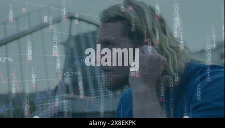 Image of falling binary codes, graphs, changing numbers, caucasian man adjusting headphones Stock Photo