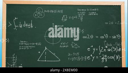 Image of mathematical data processing over green chalkboard Stock Photo