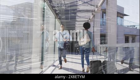 Image of interface with data processing against biracial man running in the corridor at office Stock Photo
