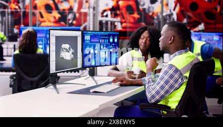 Engineer Operators Using Scada System At Industrial Plant Stock Photo