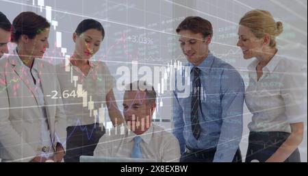 Image of financial data processing against group of diverse businesspeople discussing at office Stock Photo
