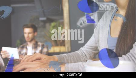 Diverse coworkers working in modern office, focusing on their tasks Stock Photo