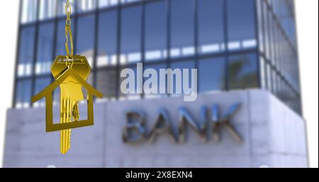 Image of key in house keychain over bank text on modern building Stock Photo